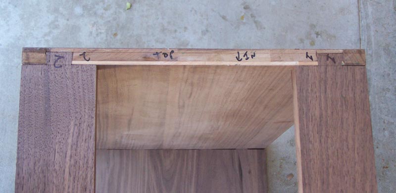 The top dovetails
